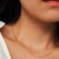 Close up of a women wearing minimalist gold chain necklace, delicate and dainty. Perfect gift for her