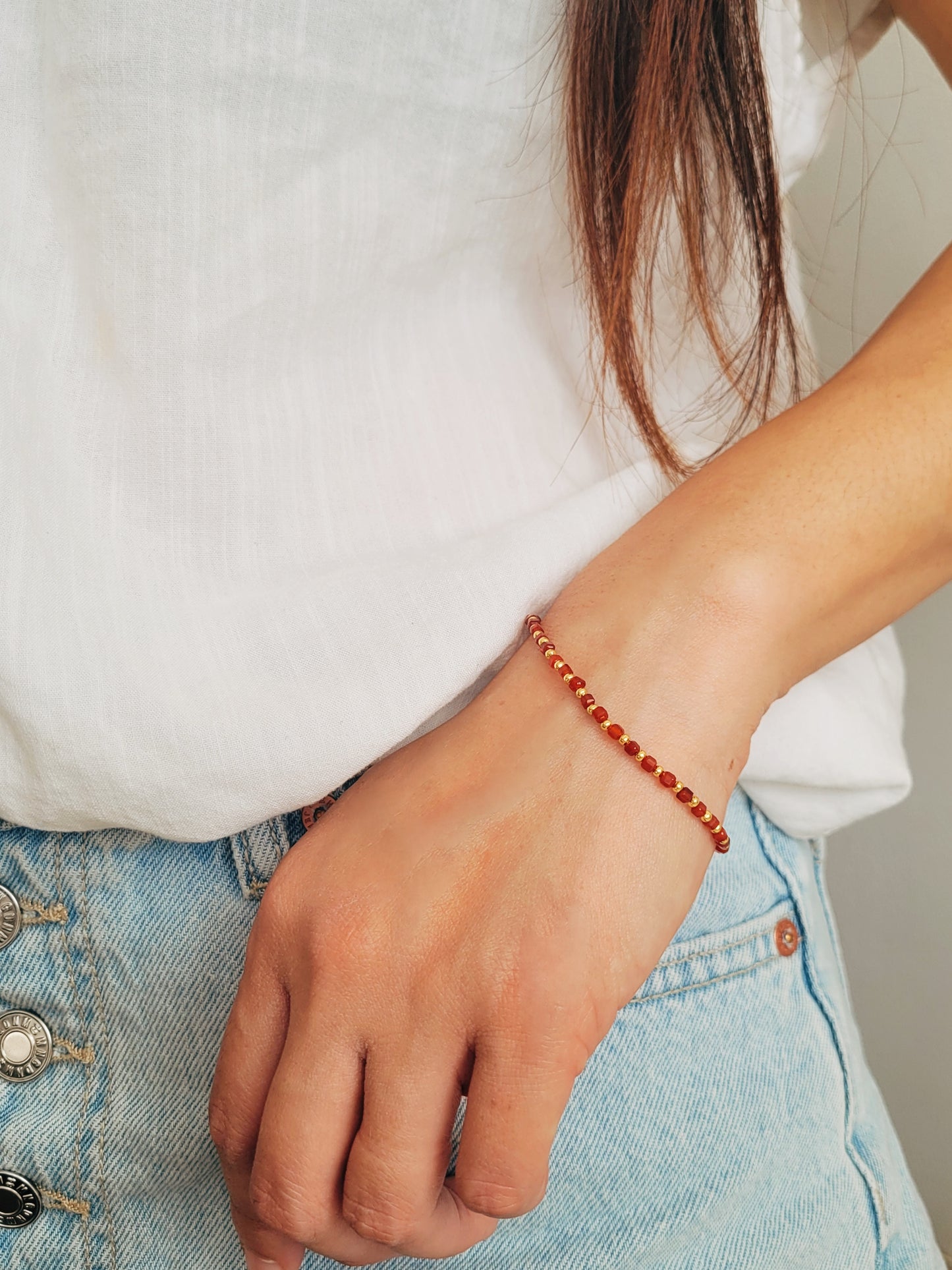 Vibrant red beaded bracelet with gold vermeil spacers, handmade jewelry